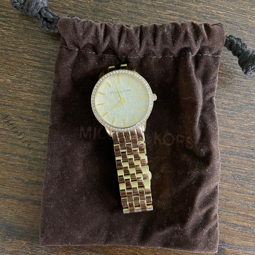 Gold Michael Kors watch with rhinestones